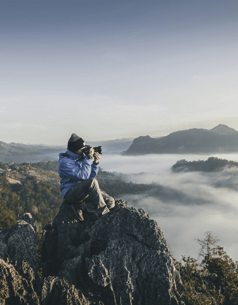 Photographer on mountain